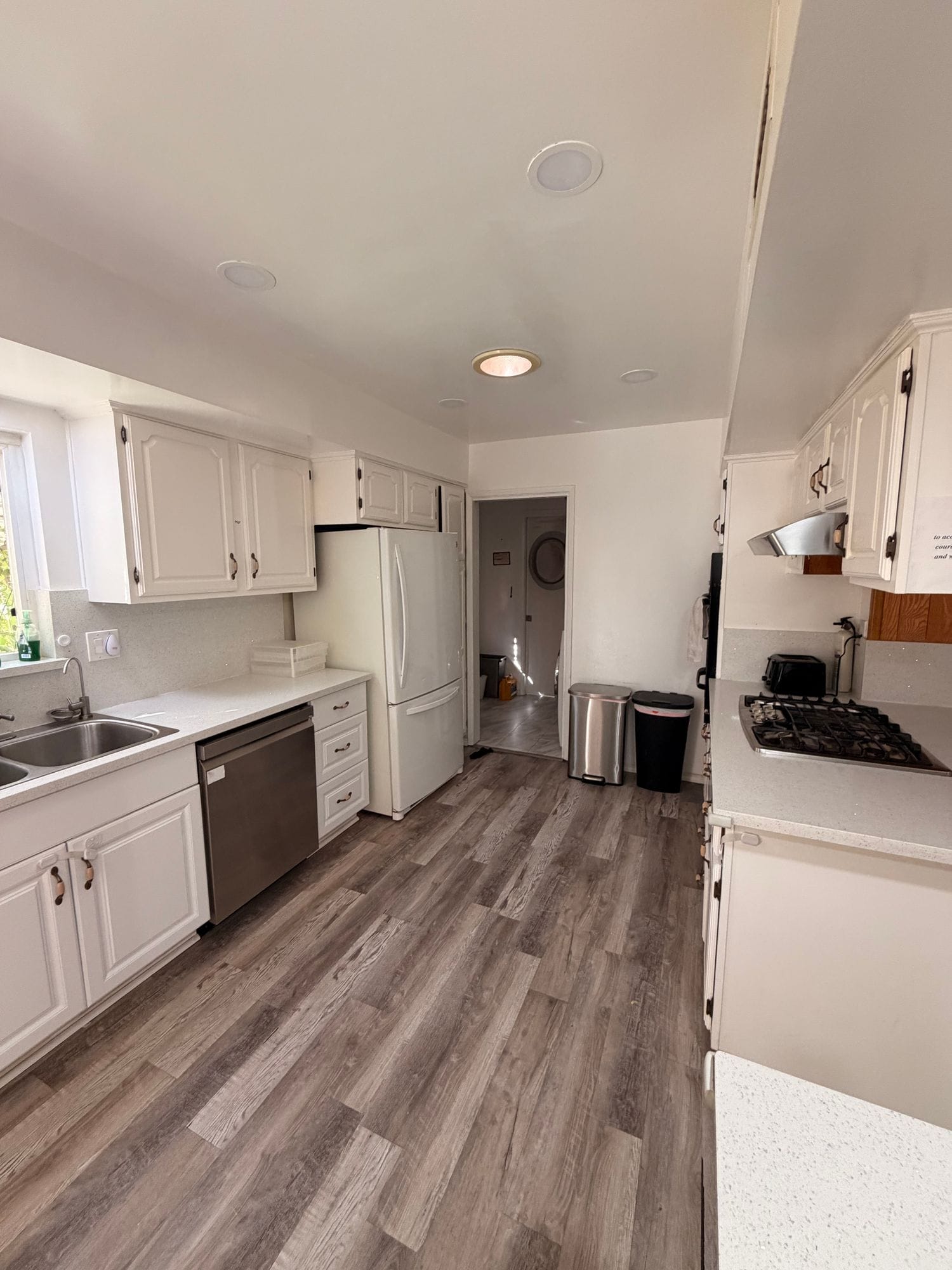 Another view of the Ranchhouse kitchen, looking toward the hallway past the refrigerator